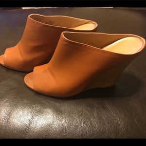 Nine West peep toe wedge mules.